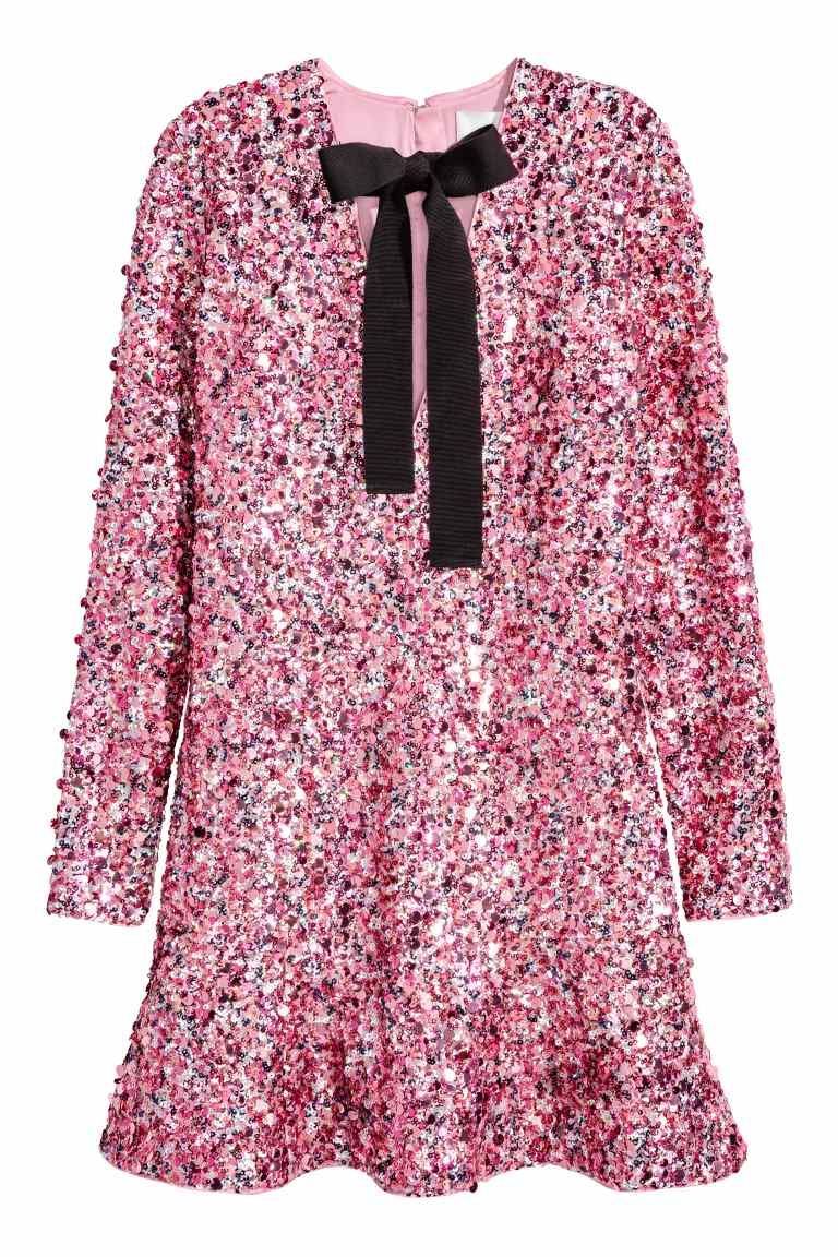 viral h&m sequin dress Day 2 of 12 days of festive outfits The viral @H&M dress that we all love! The bow in the back is the main character, however the stunning white sequins are truly stunning! If you need to make this