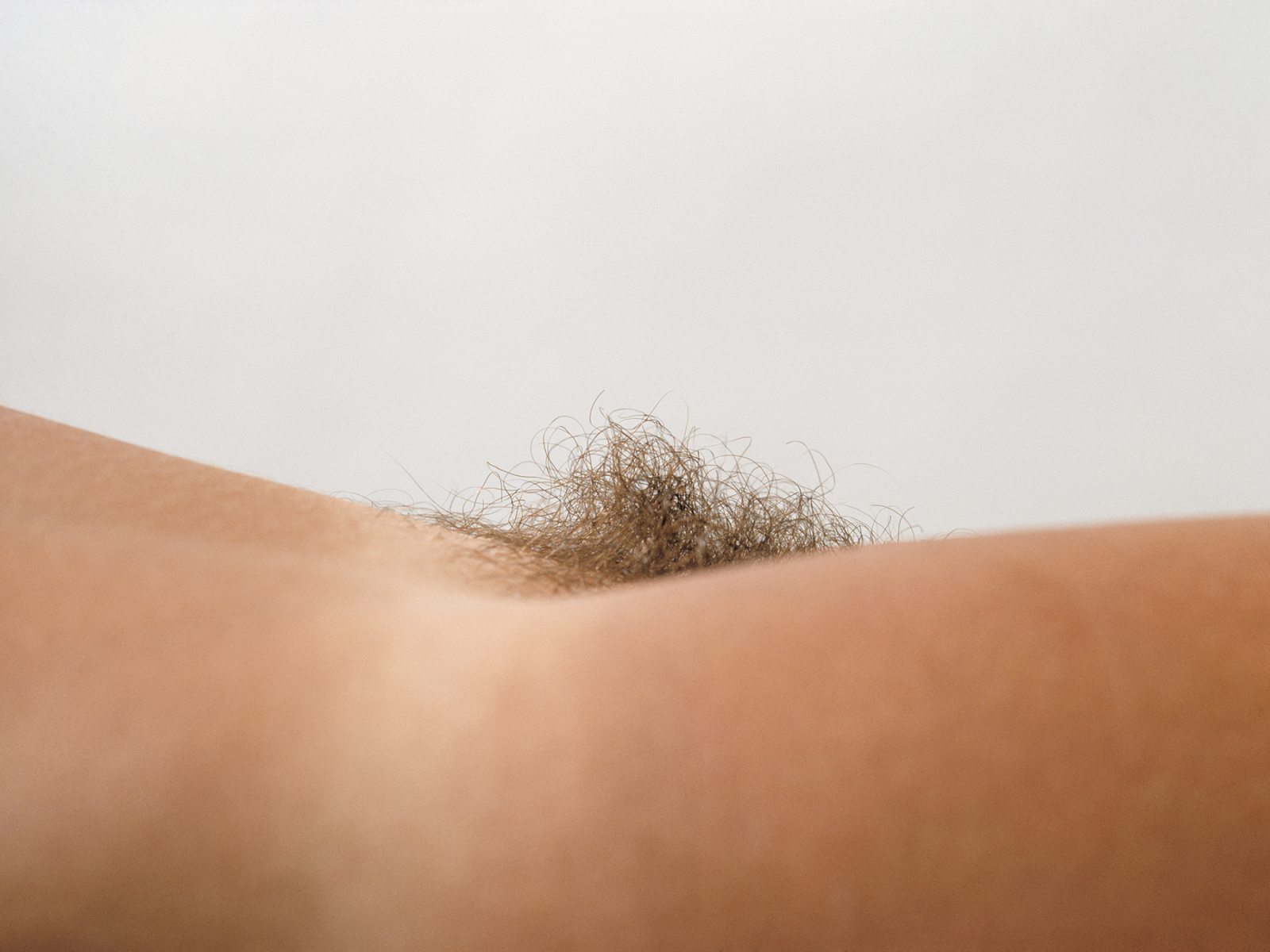 Shaved pussy with a square of hair